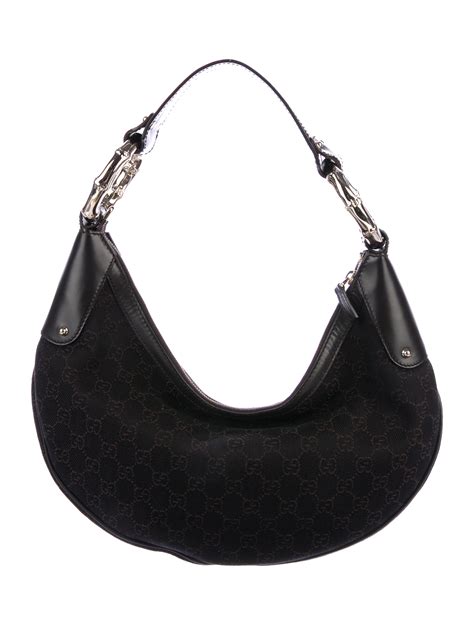 half moon shaped designer handbags.